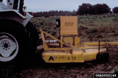 Figure 13a. Burch Wet Blade Mower used for applying the bacterial pathogen Ralstonia solanacearum (E.F. Smith) Yabuuchi to tropical soda apple, Solanum viarum Dunal. (Photograph courtesy of R. Charudattan.)